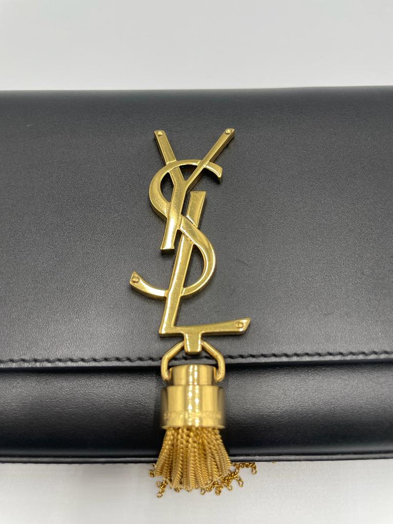 Yves Saint Laurent Golden Clutch with Tassels
